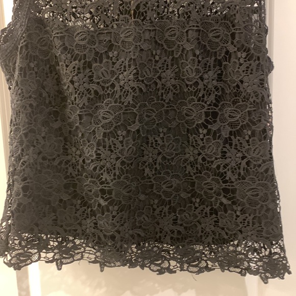 Exquisite black, lace blouse over a black camisole. - Picture 2 of 6